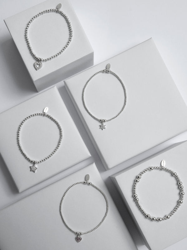 Shimmering Charm Bouquet Bracelet Stack