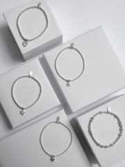 Shimmering Charm Bouquet Bracelet Stack